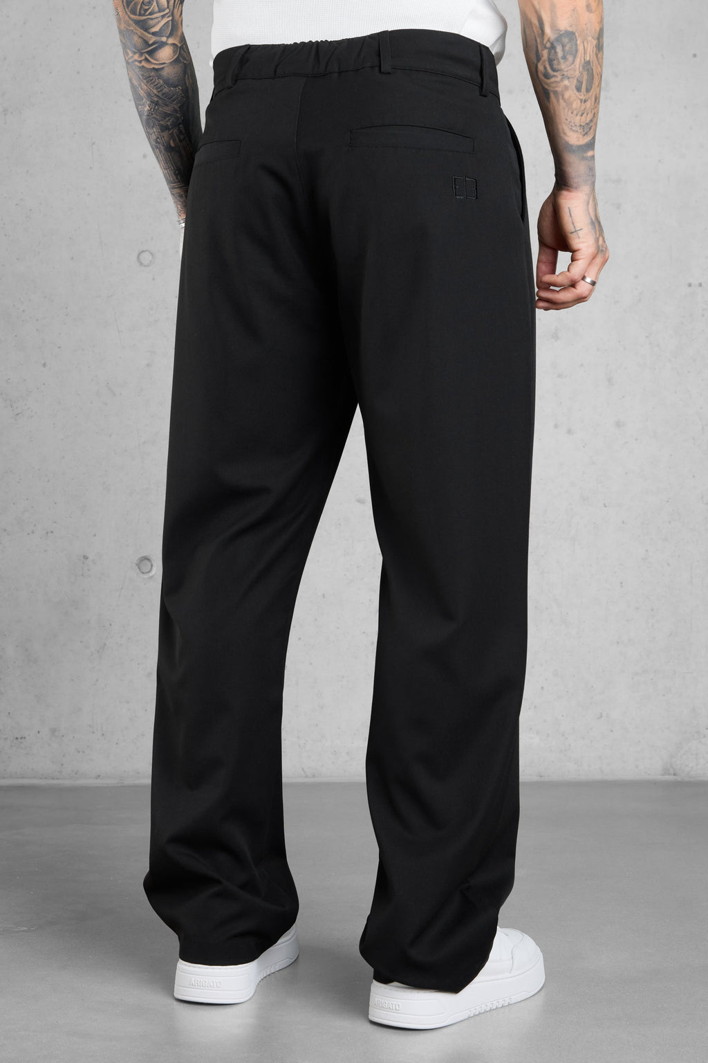 Pantalones negros anchos de corte sastre