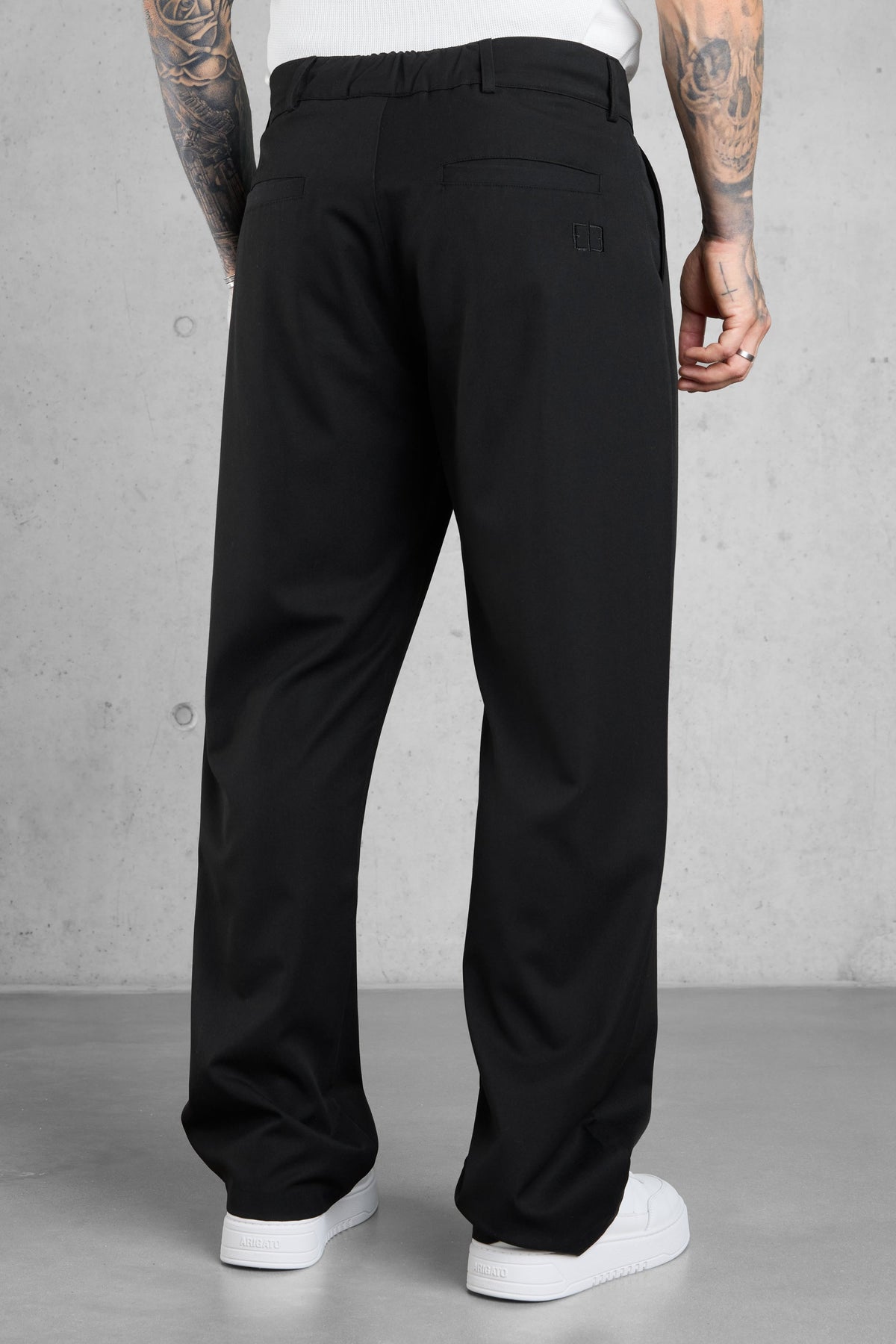 Pantalones negros anchos de corte sastre